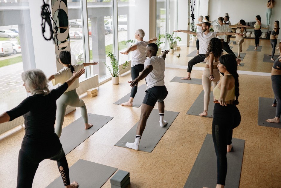 Adults in a relaxed group exercise class