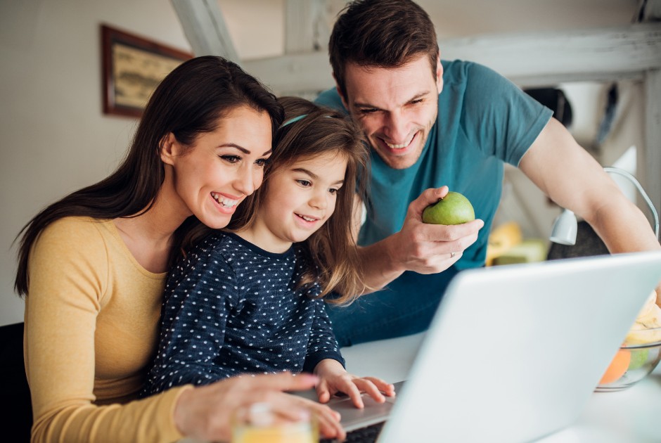 Parent and child reviewing care together at home
