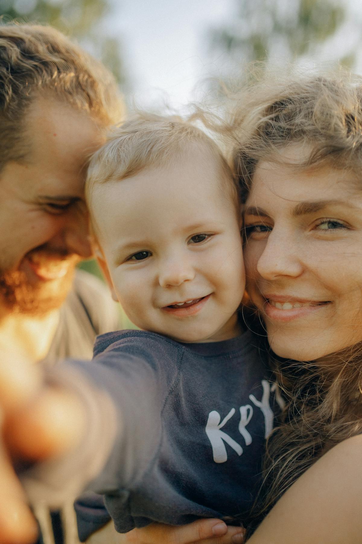 Smiling parents with their child