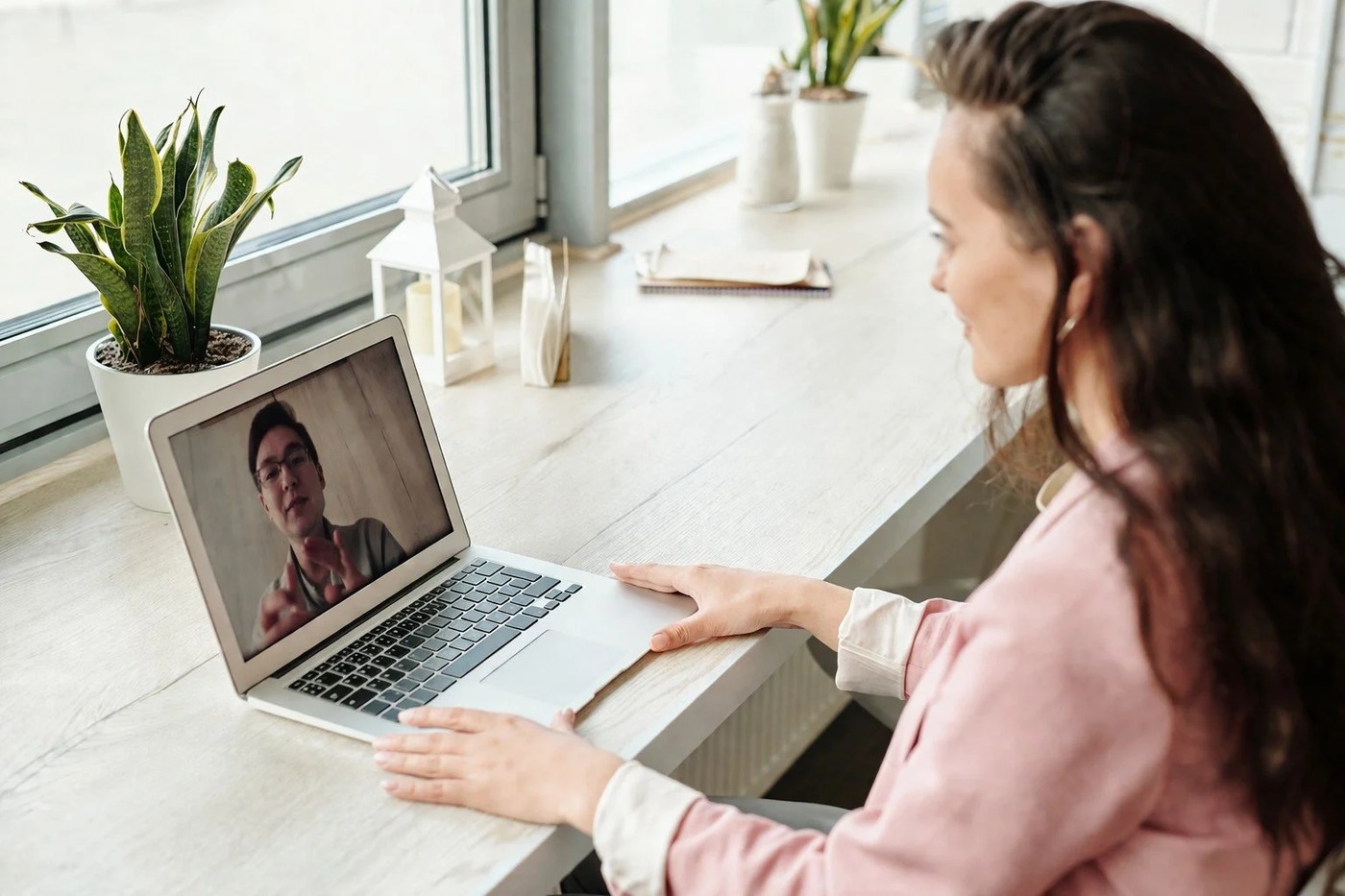 Woman on video consultation with doctor